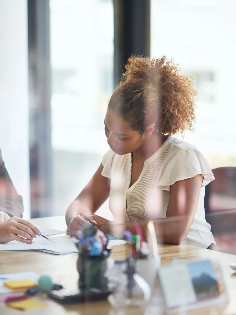 Accountant reviewing documents with a client