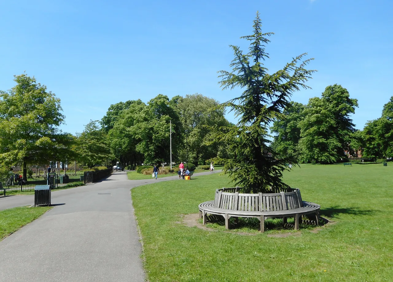 Acton Green Common with a bench and footpath