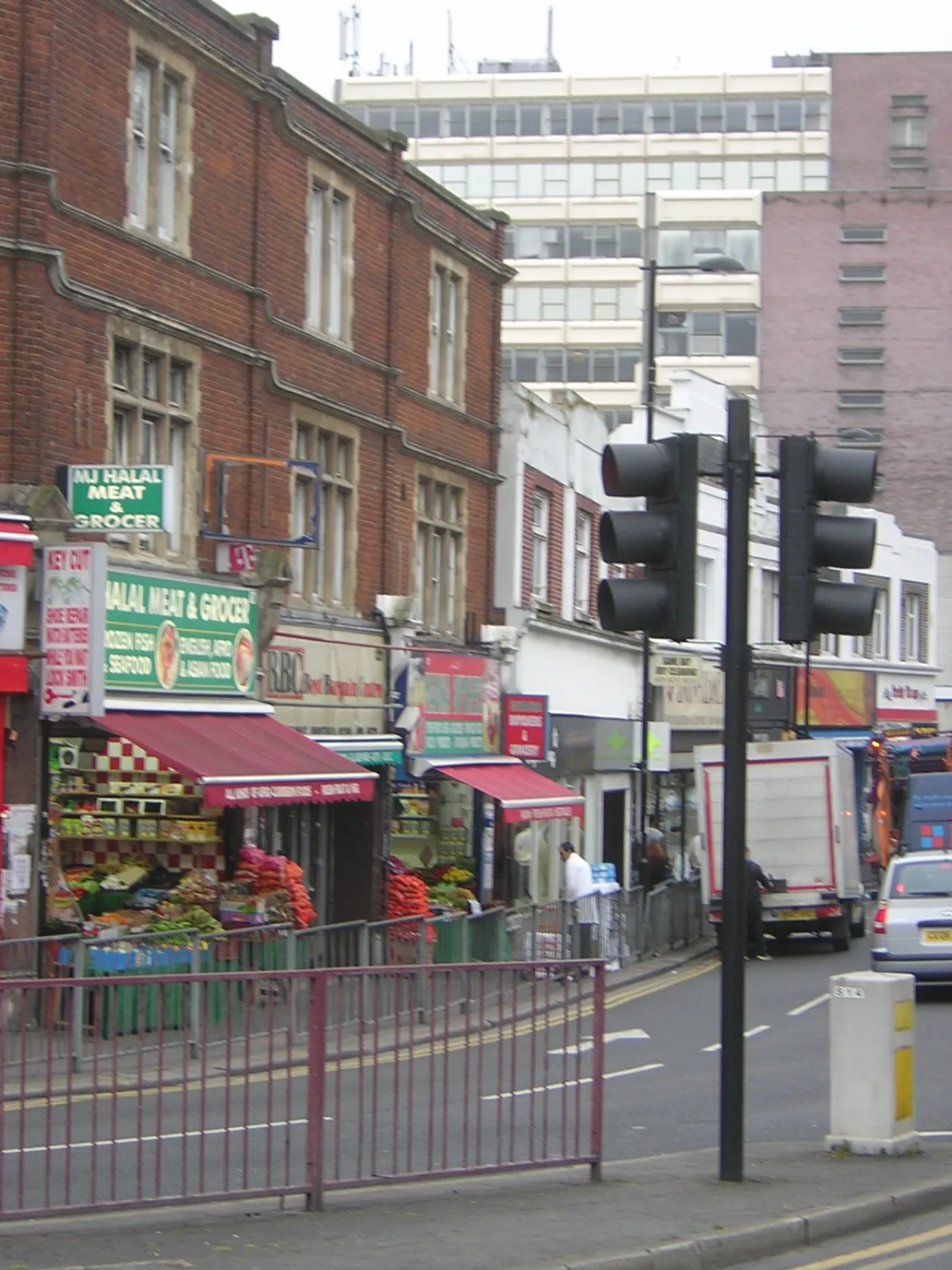 Shops on Thornton Heath High Street, near Addiscombe, on a busy street corner