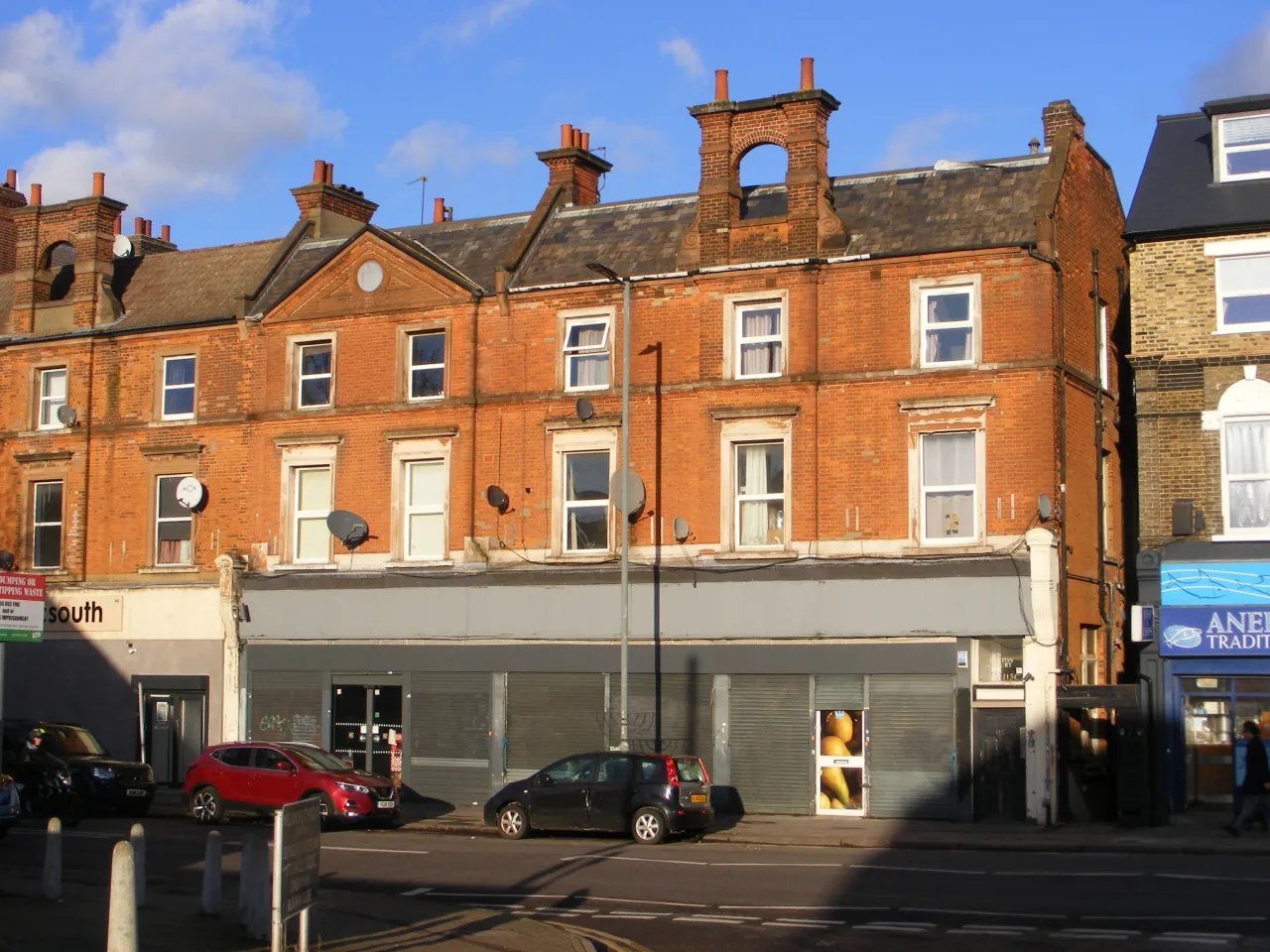 Row of shops and flats on Anerley Road, the SE20 high street