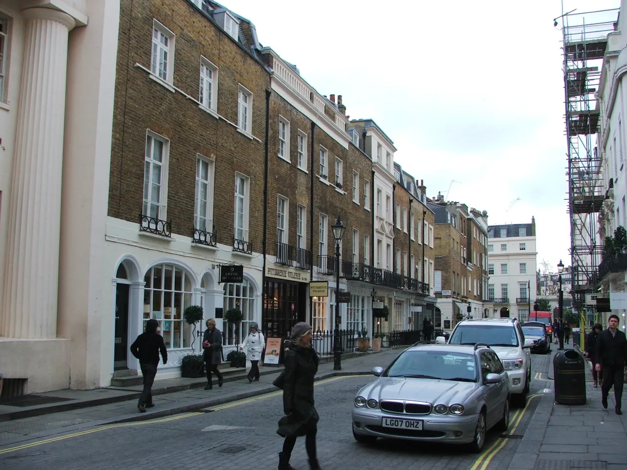 Motcomb Street, Belgravia, with pedestrians and parked cars