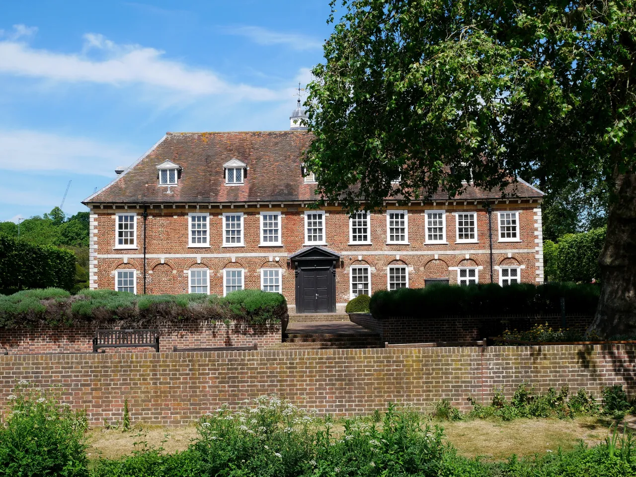 Hall Place, the historic manor house near Bexley Village, seen across the River Cray