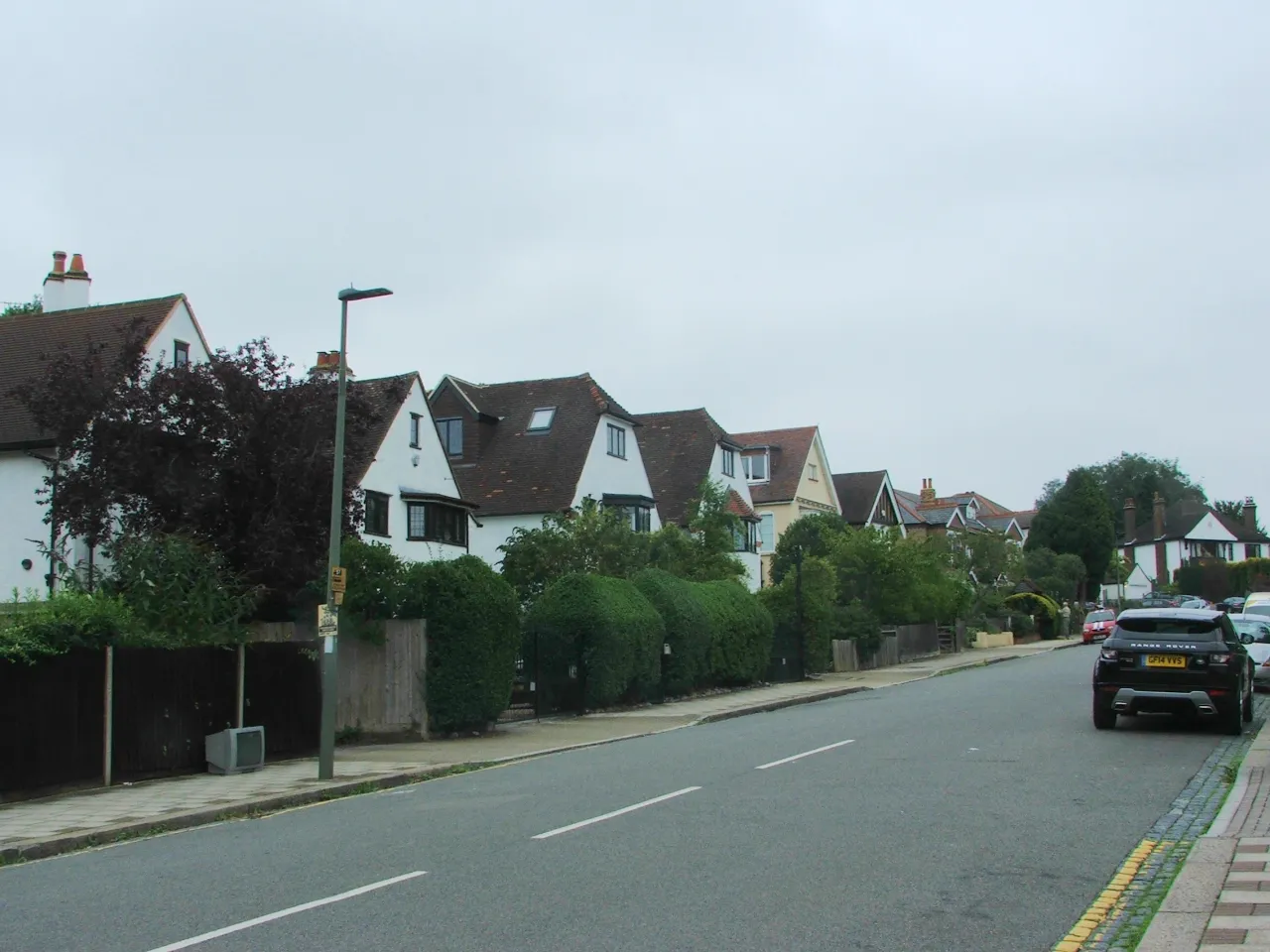 A residential street of substantial houses at Shawfield Park, Bickley