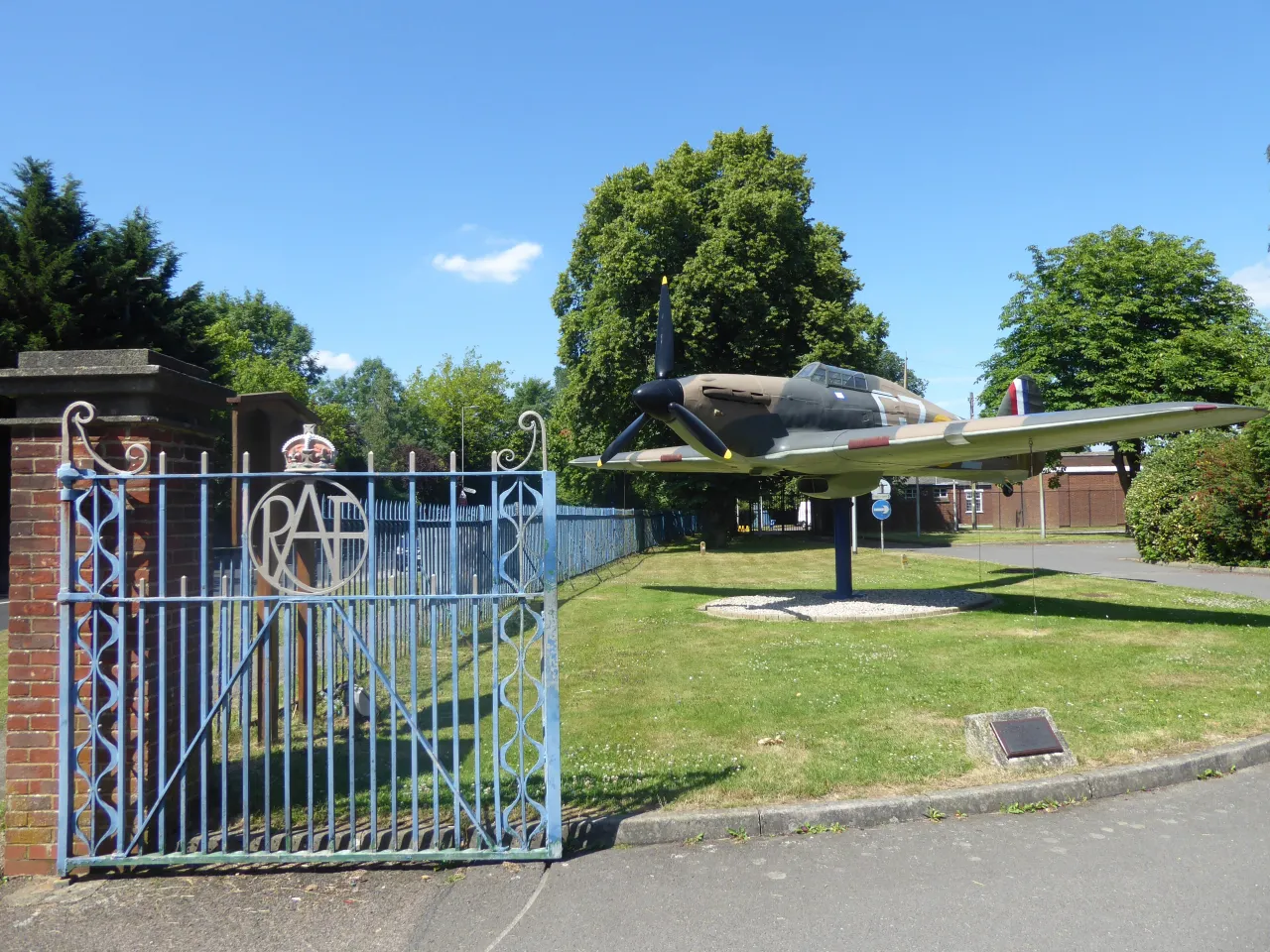 St George's Chapel of Remembrance at Biggin Hill, with a mounted Hurricane fighter outside