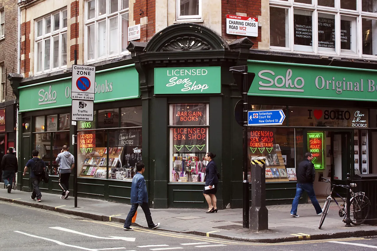 Charing Cross Road bookshops near Soho, London, with pedestrians