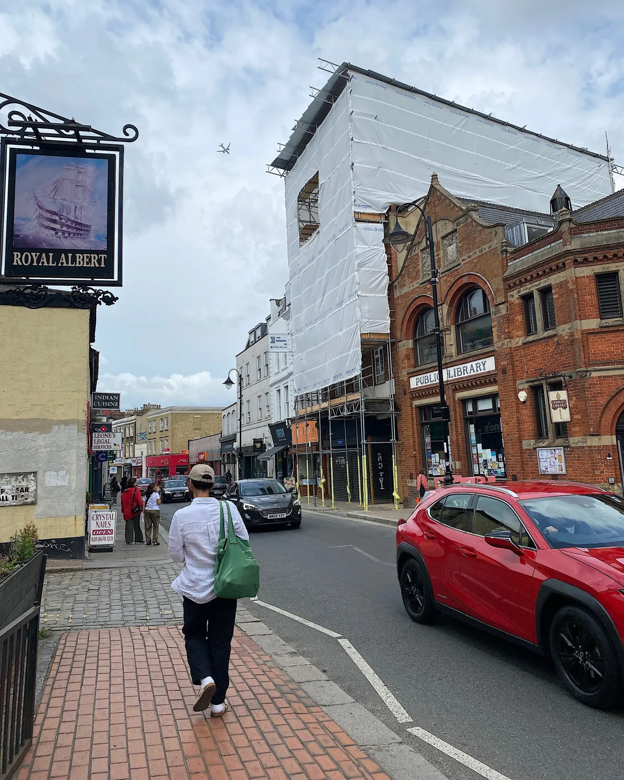 Westow Hill in Crystal Palace, shops and pedestrians along the street