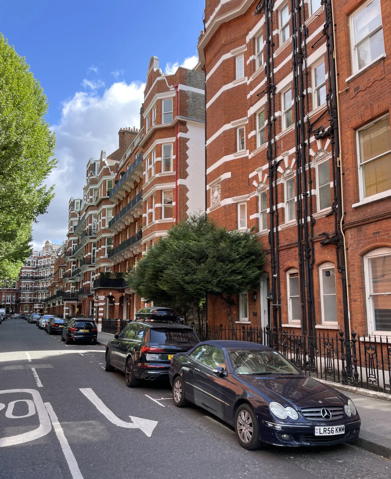 Barkston Gardens in Earls Court, a red-brick terrace of houses and hotels