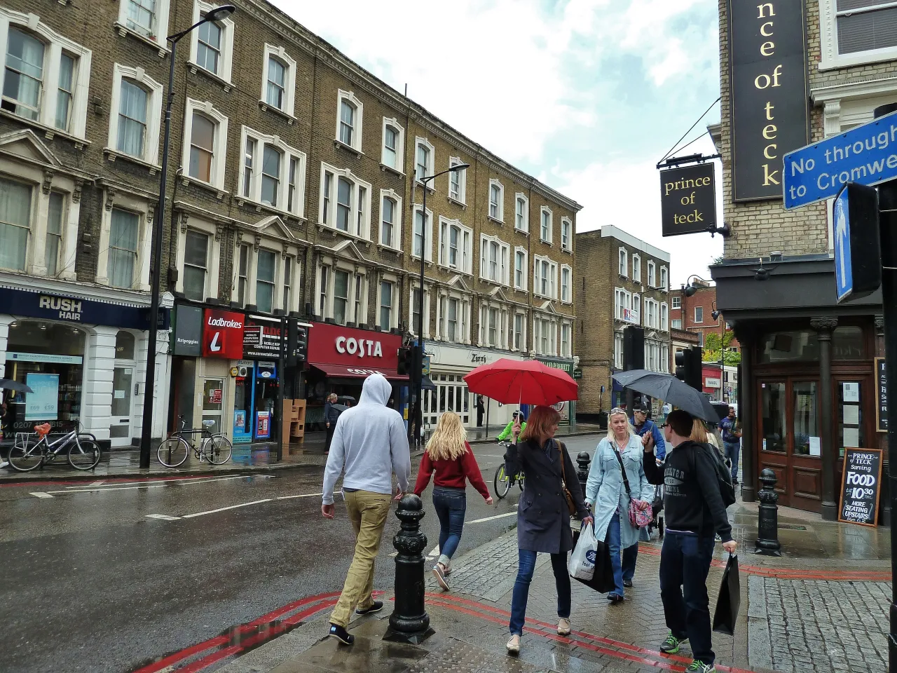 Earls Court Road street scene with cafes and pedestrians, Kensington