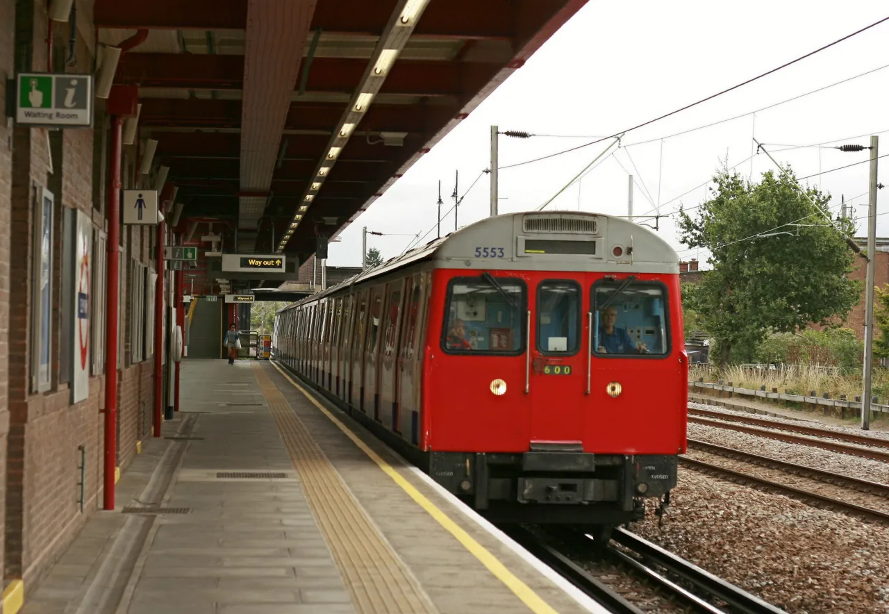 District line C stock train arriving at Elm Park Underground station Park Underground station