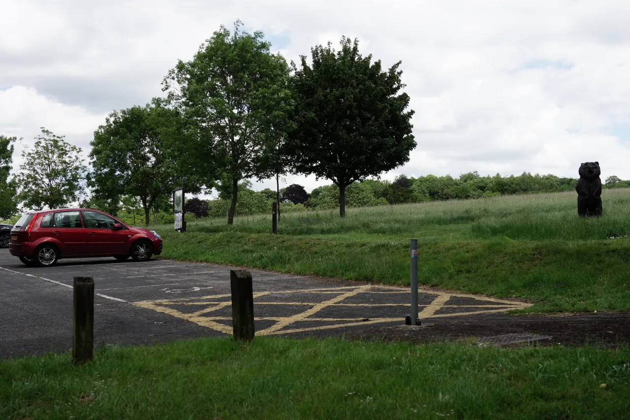 The car park and open grass at Selsdon Wood, on the edge of Forestdale, Croydon