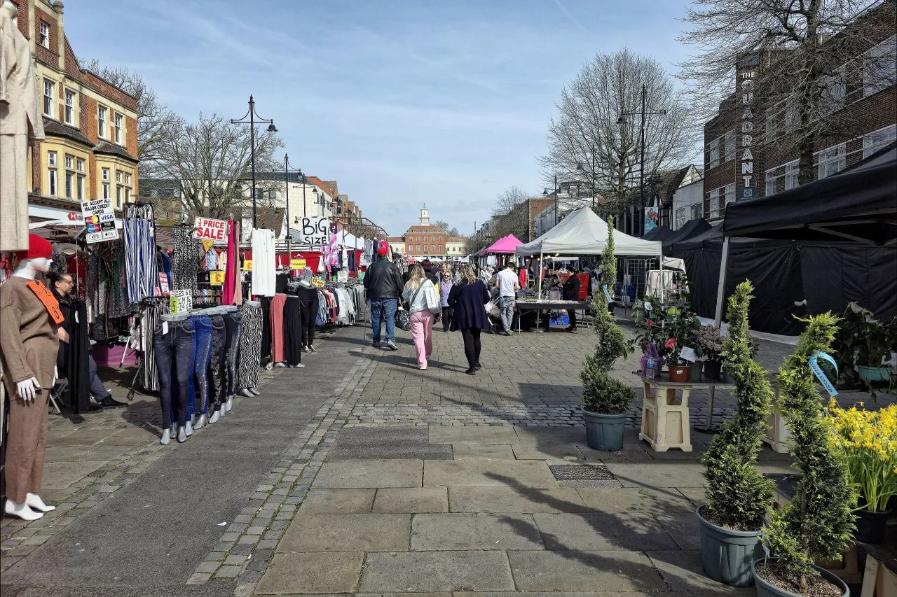 Shoppers browsing stalls at Romford Market, near Gidea Park in Havering