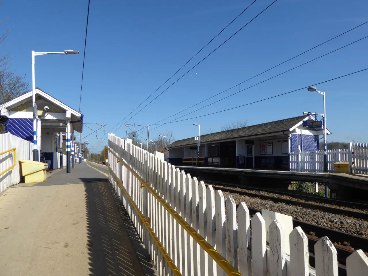 The platform and approach slope at Grange Park railway station, Enfield