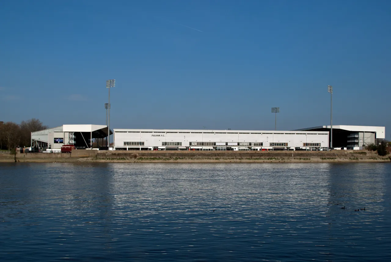 Craven Cottage, Fulham's football stadium, seen from across the Thames
