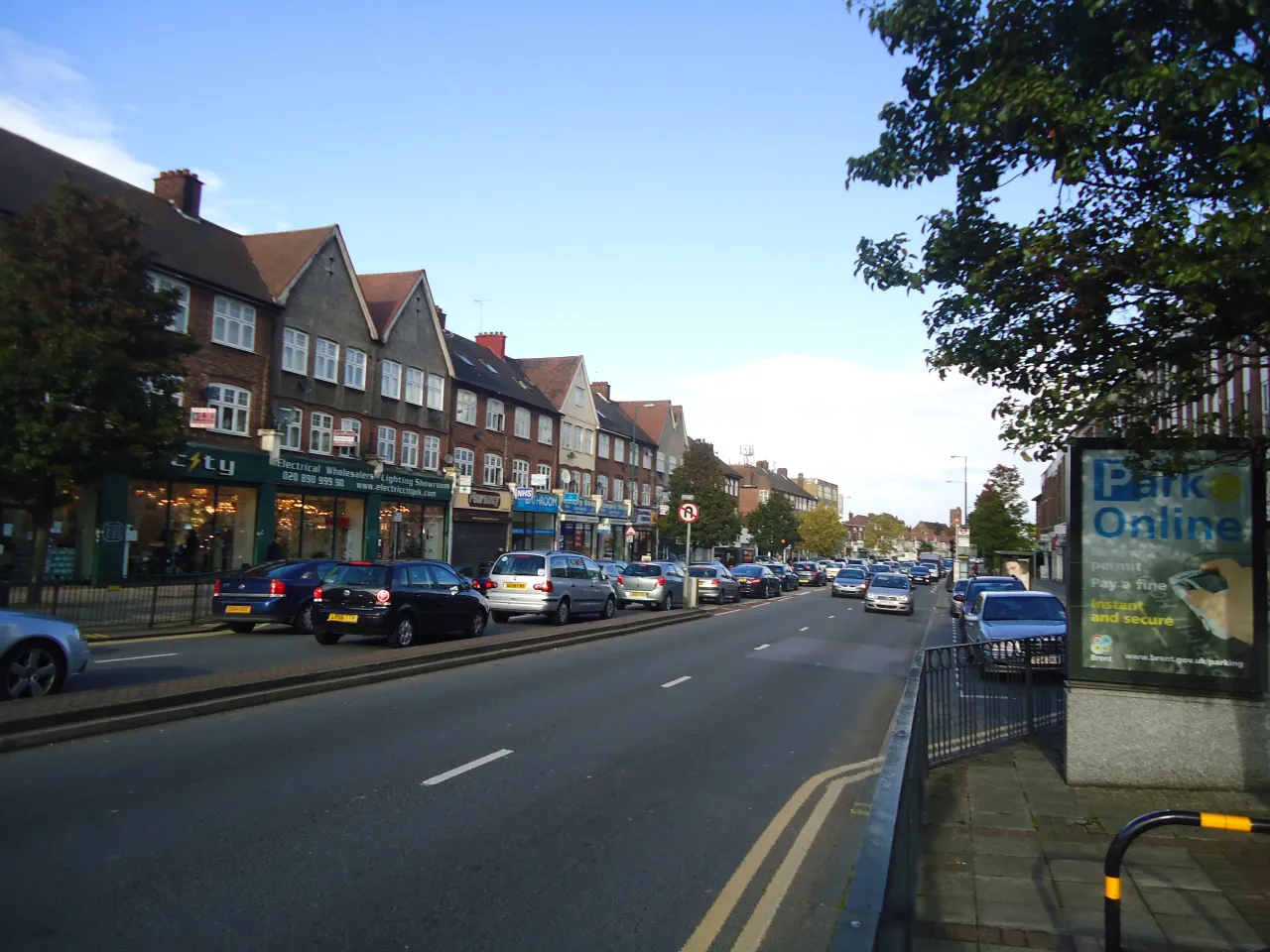 Kenton Road's parade of shops and traffic, the suburb's main high street