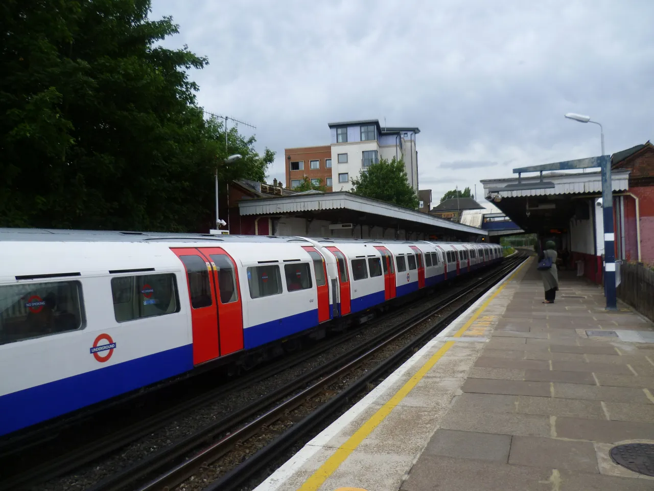 A London Underground Bakerloo line train at Kenton station platform