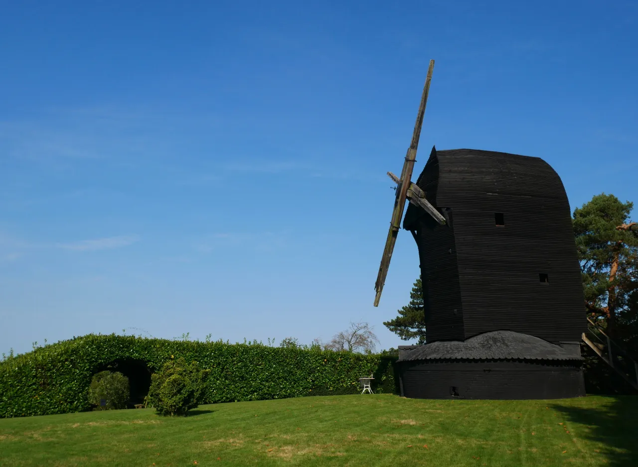 The historic black smock windmill on Keston Common