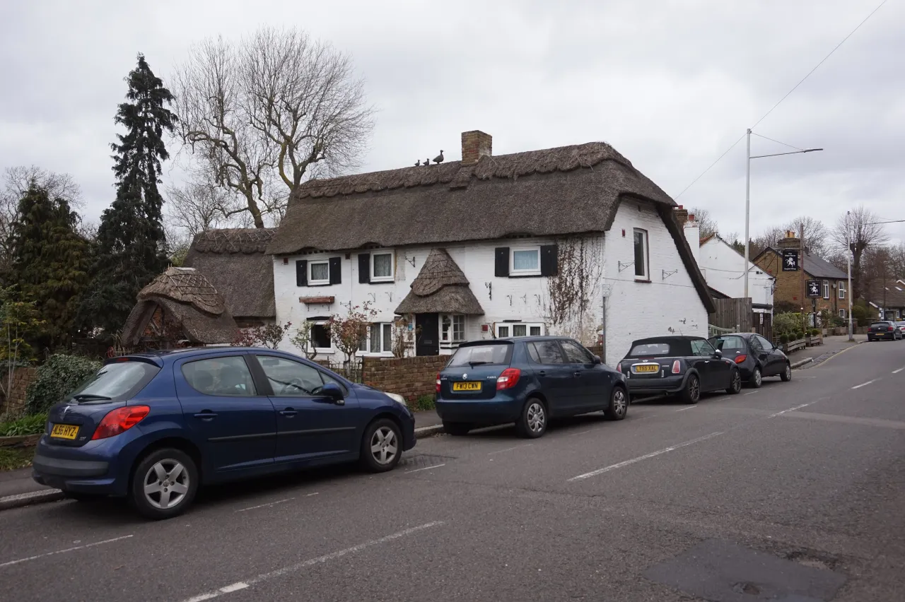 A thatched cottage on Bath Road in Longford village