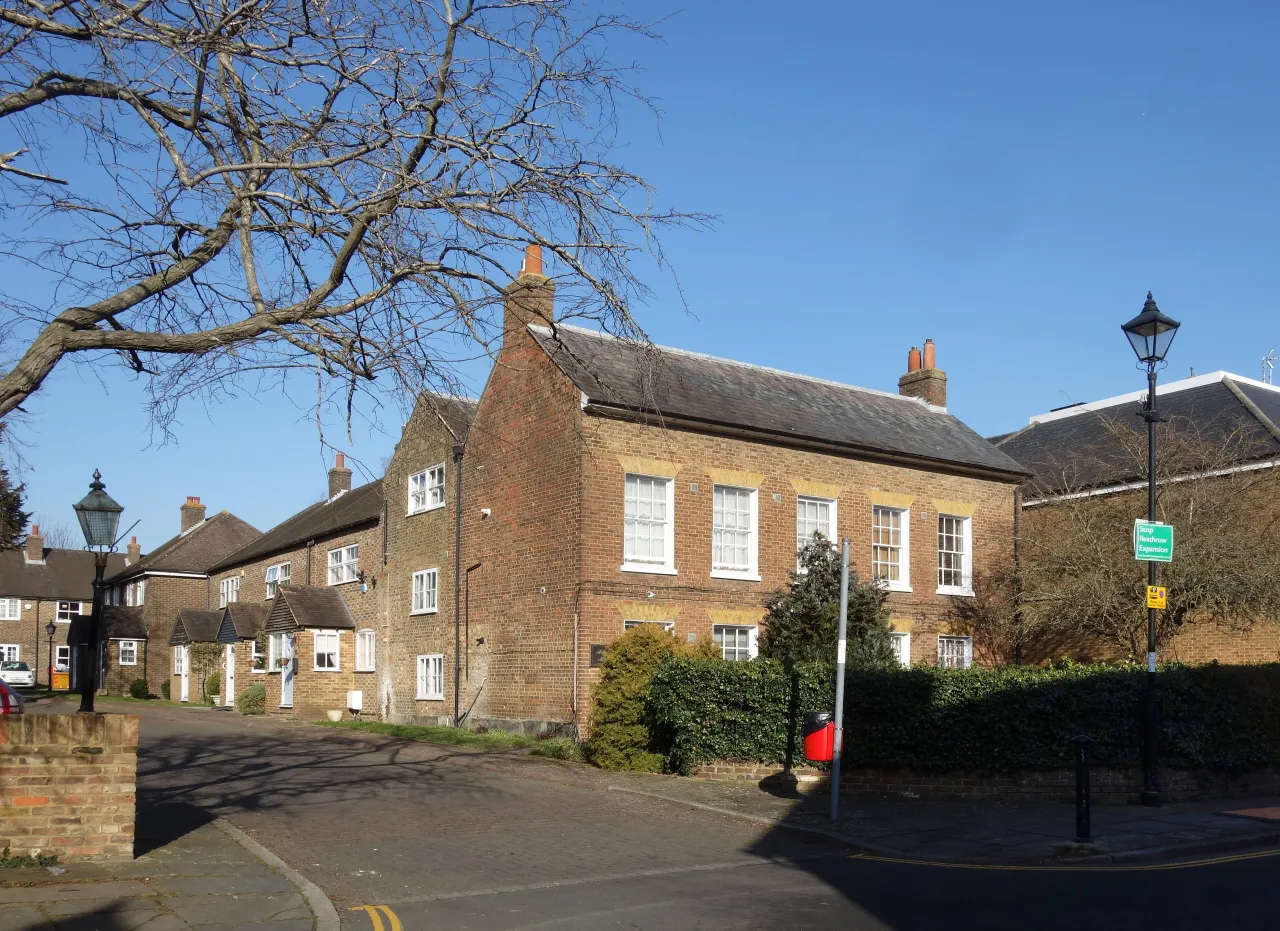 Historic brick houses in the centre of Harmondsworth, the neighbouring village near Heathrow's western edge
