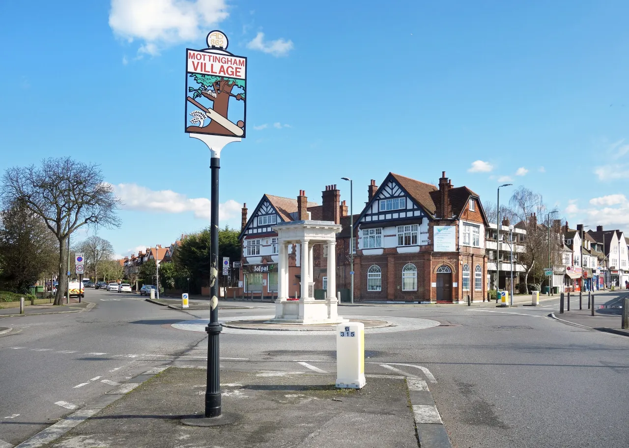 The village sign and historic buildings at the heart of Mottingham