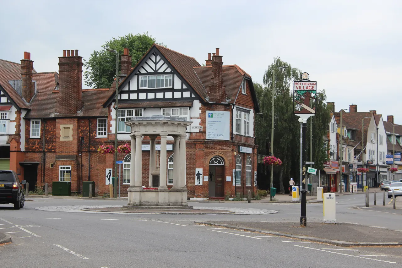 The war memorial and historic mock-Tudor buildings at the Mottingham Road/Court Road junction