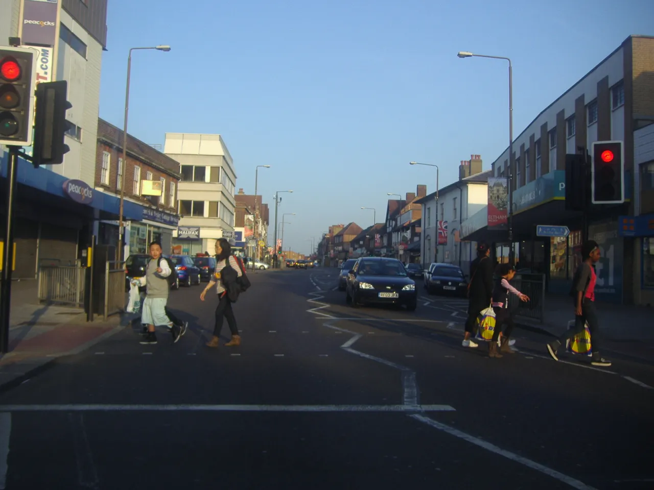 People crossing Eltham High Street, the town centre next door to Mottingham