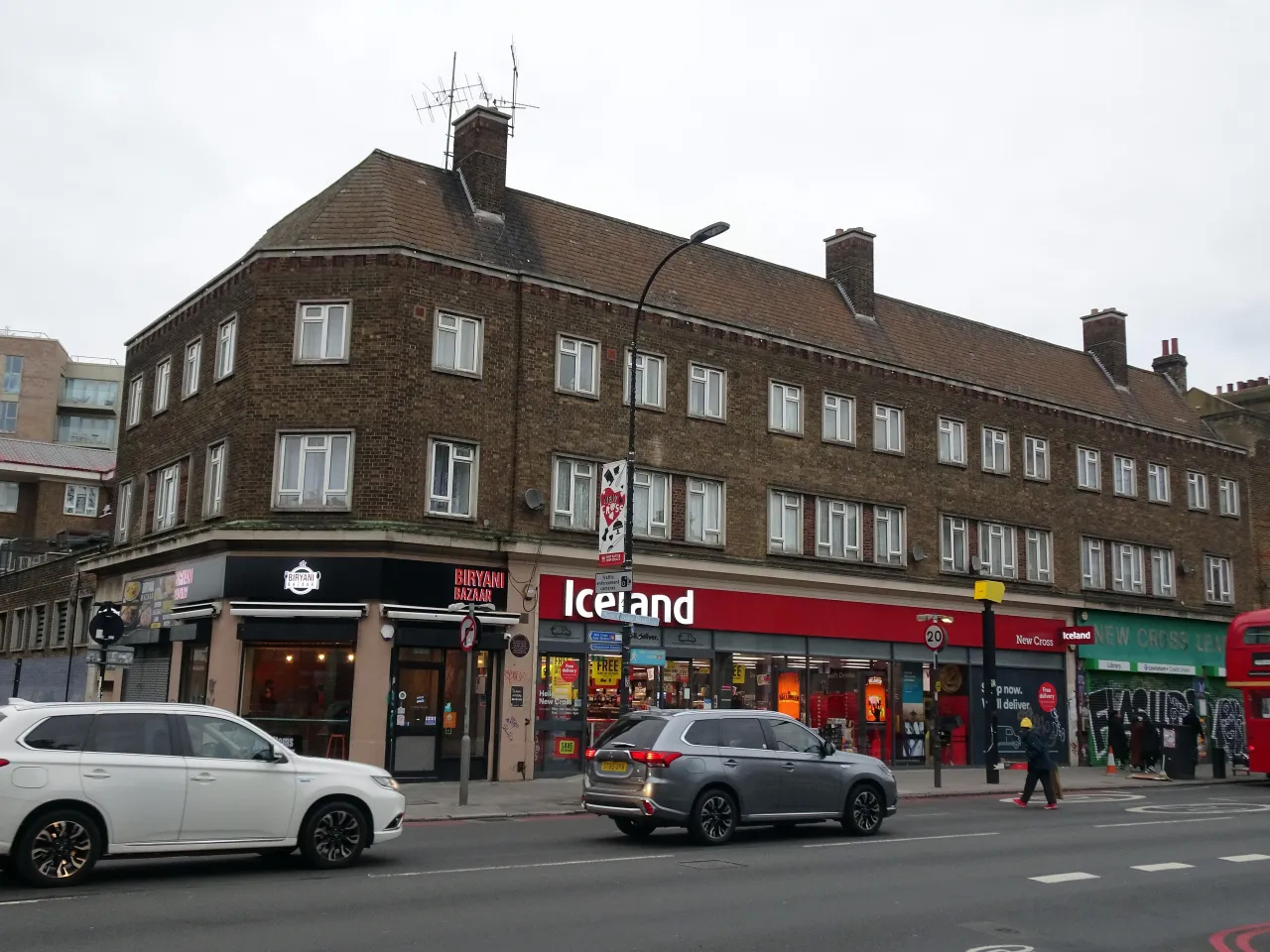 A parade of shops on New Cross Road, including an Iceland supermarket