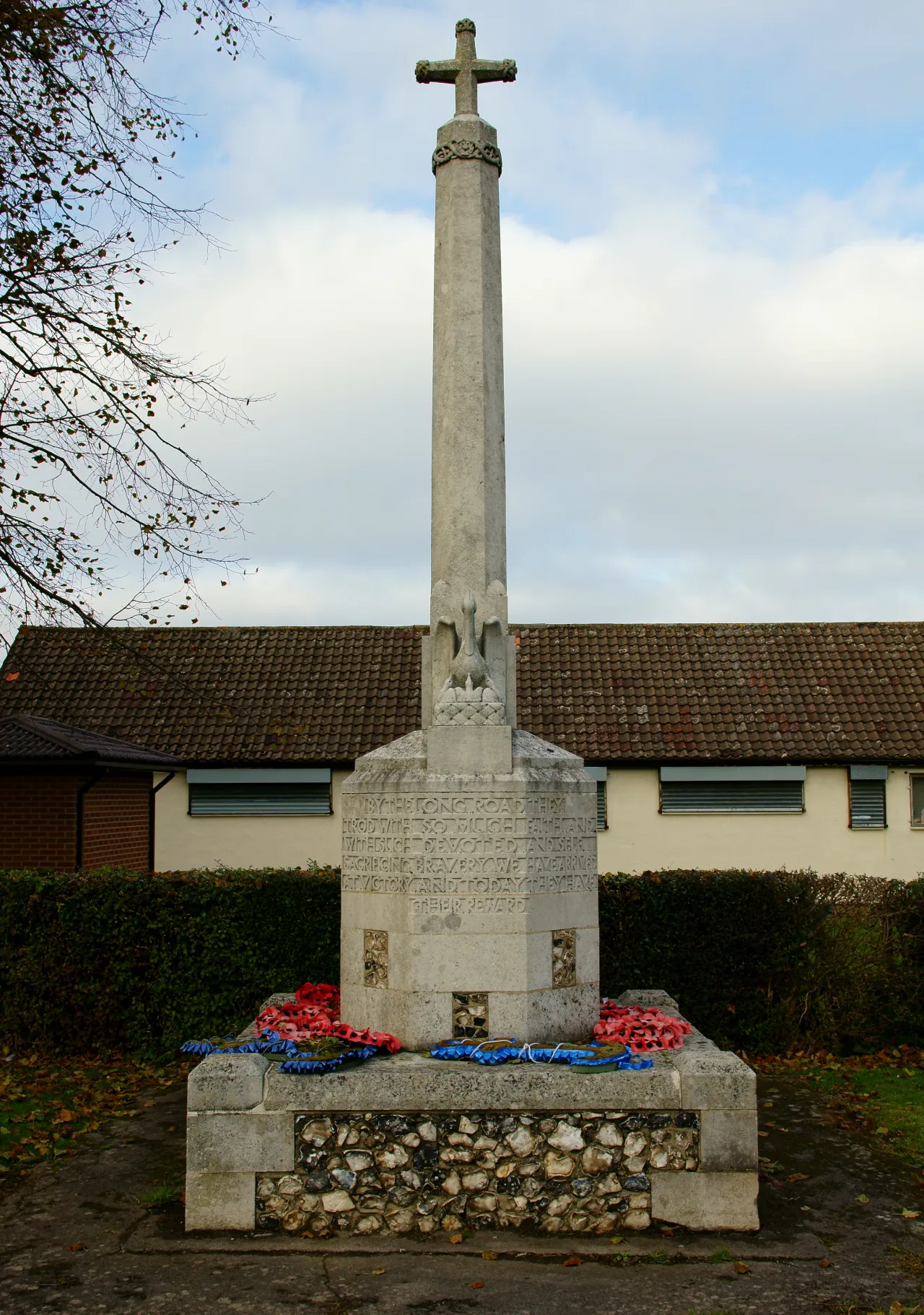 The war memorial cross on the green in Old Coulsdon village