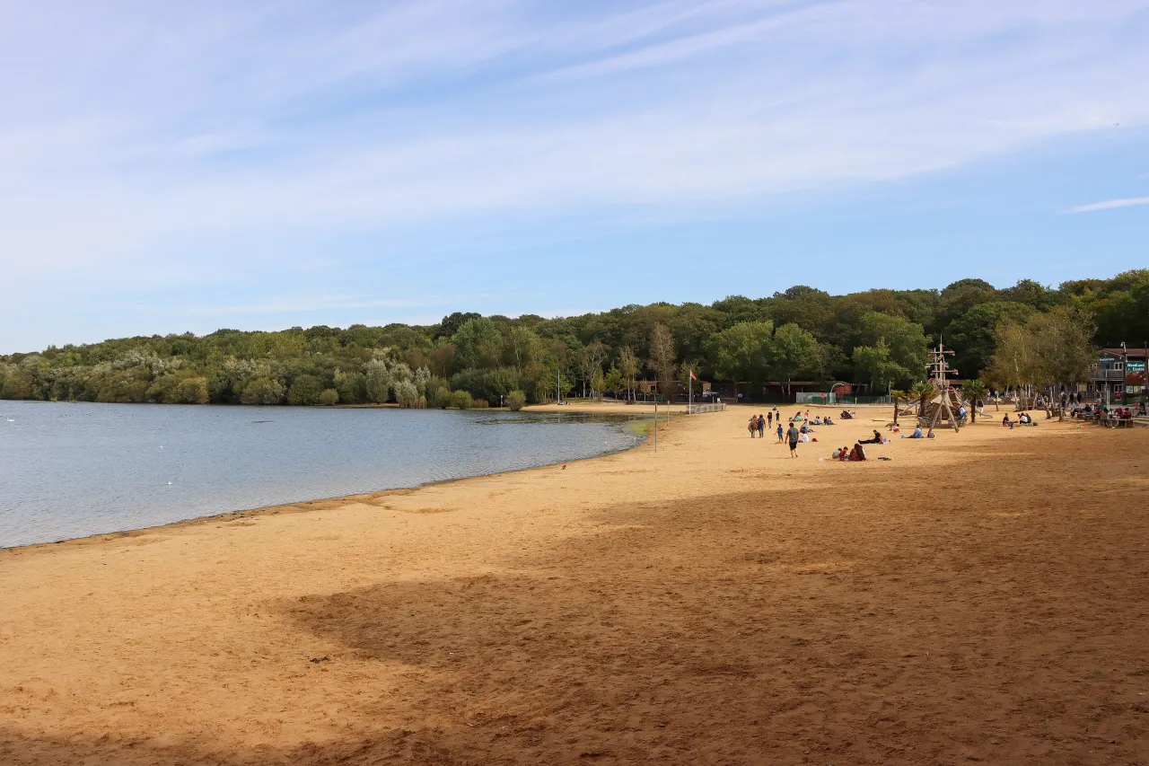 People on the sandy beach at Ruislip Lido