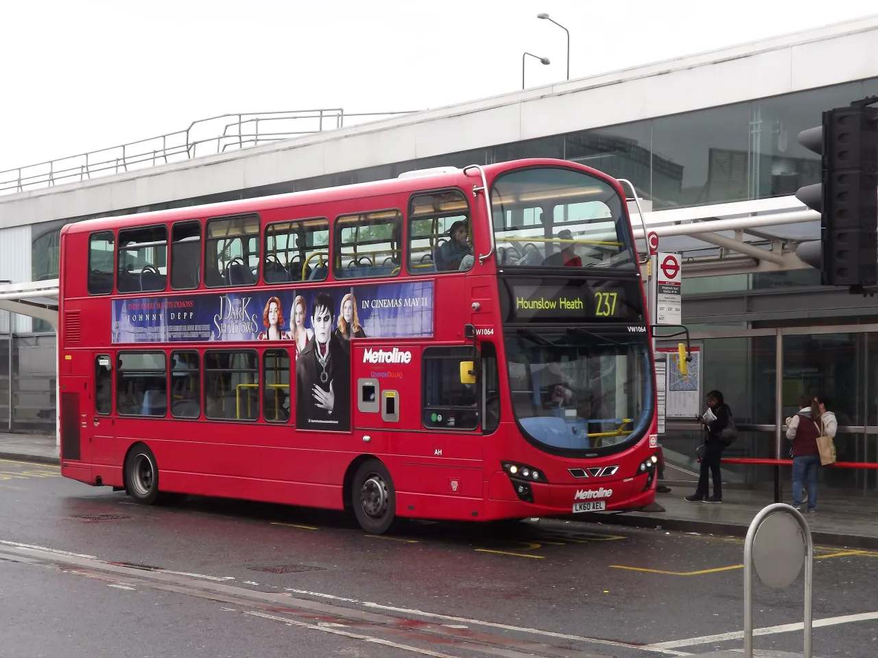Bus stop and double-decker bus outside Shepherds Bush station transport interchange