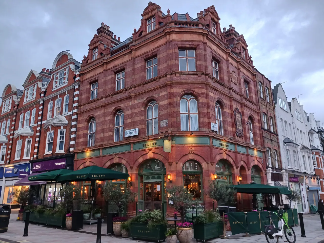 Corner of St John's Wood High Street and Allitsen Road, with shops and cafes