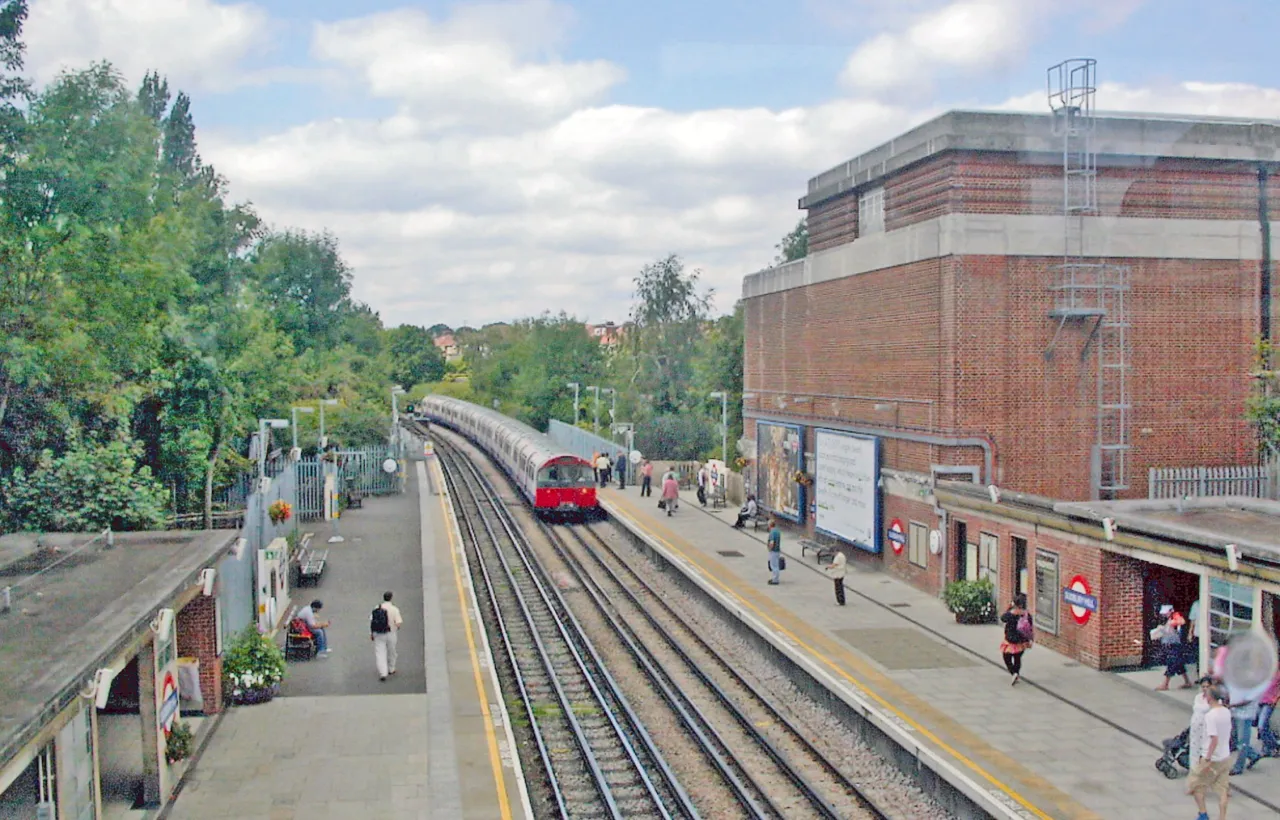 Sudbury Hill tube station platform with a train, Brent