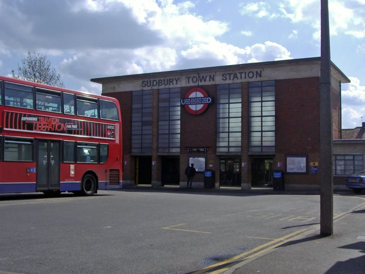 Sudbury Town Underground station with a London bus outside, Brent