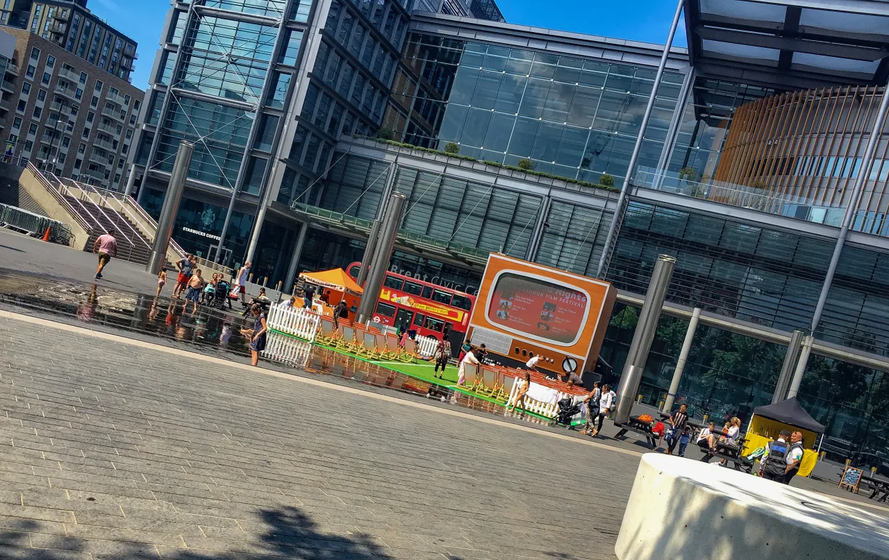 Brent Civic Centre plaza in Wembley Park with people outside