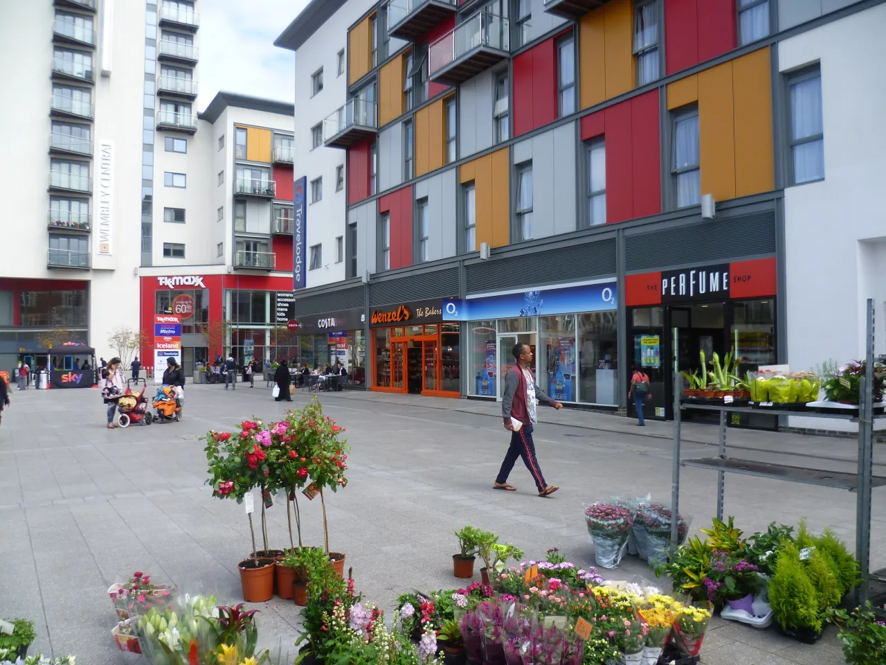 Central Square in Wembley, with a flower stall and shops